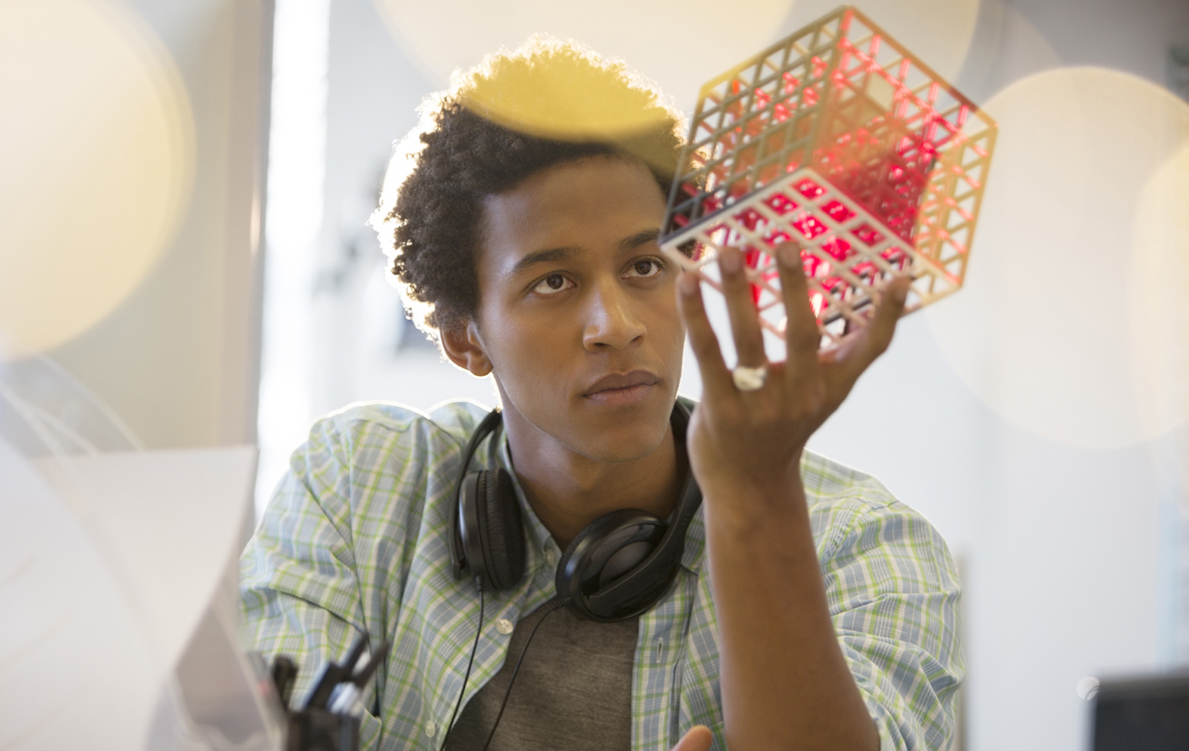 Man with cube - Rob Austin Impact