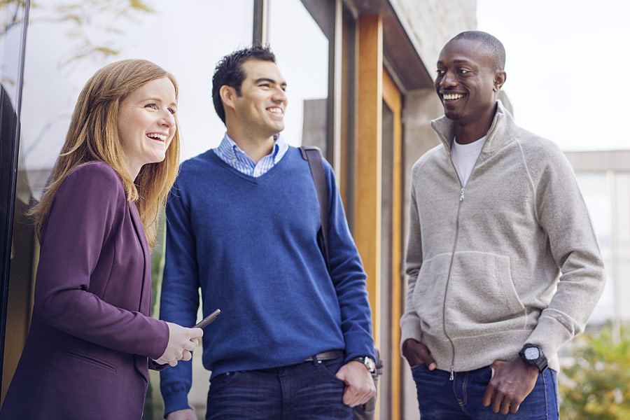 Diverse group of Ivey students talking