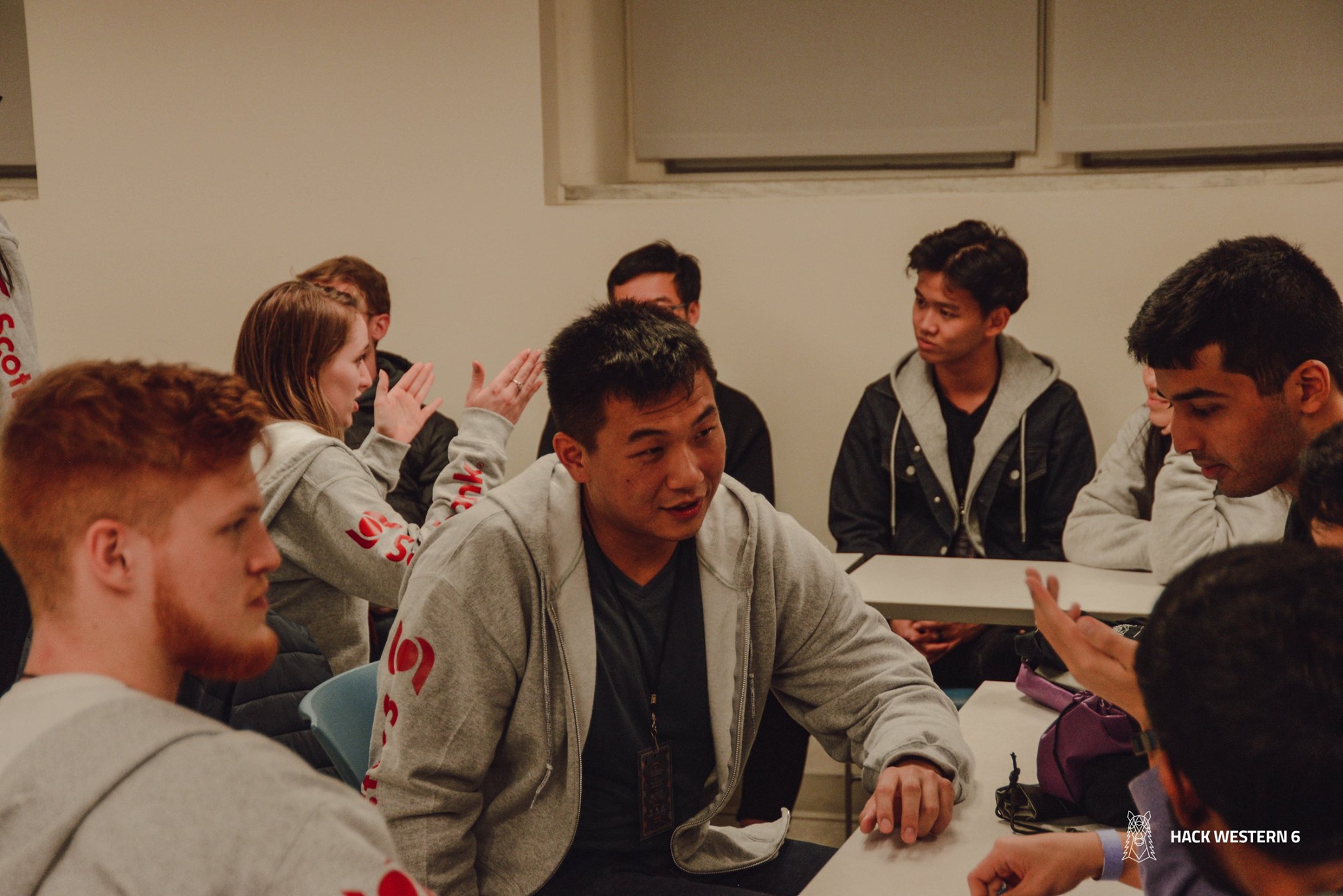 Group of students talking at the Hack Western 6 event