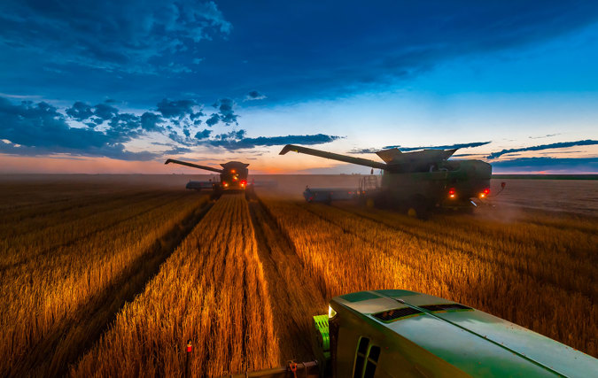 Combines Working At Night Farming