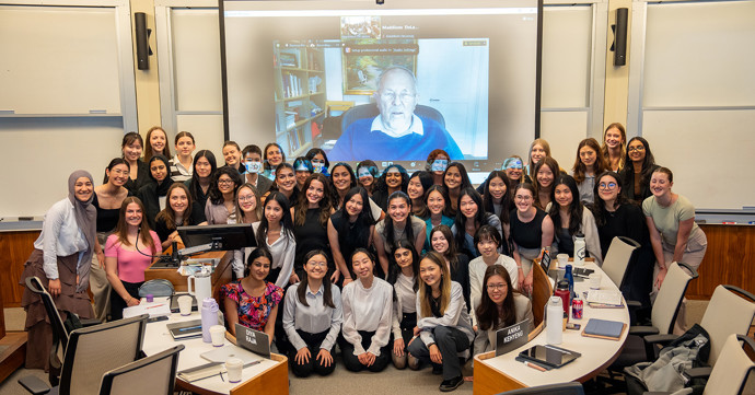 Ivey's WAM students pose with William Sharpe (on screen).