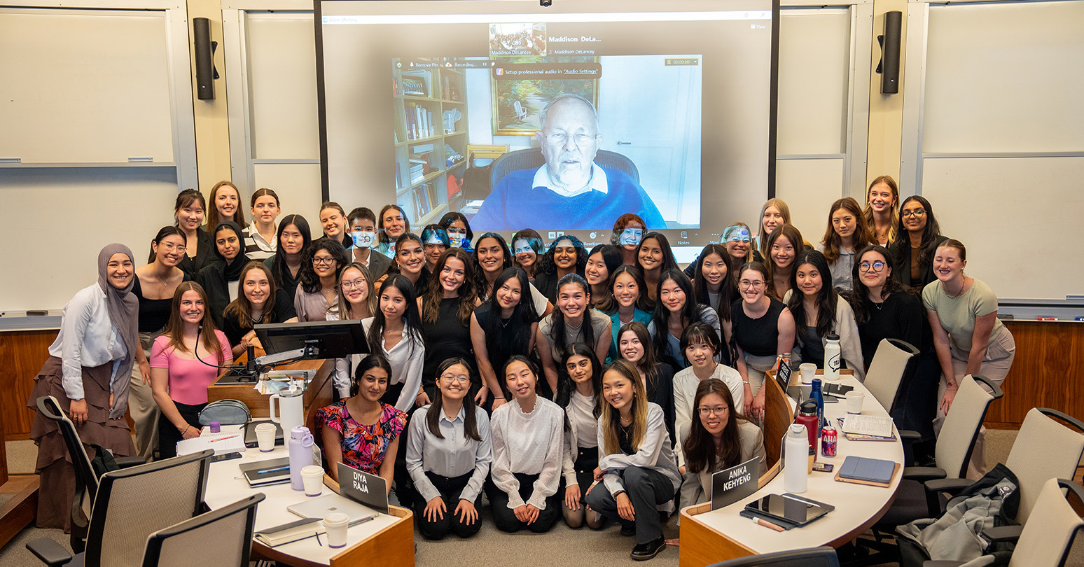 Ivey's WAM students pose with William Sharpe (on screen).