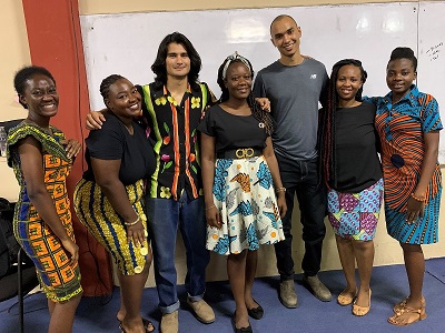 Kofi Richter (5th from left) with students