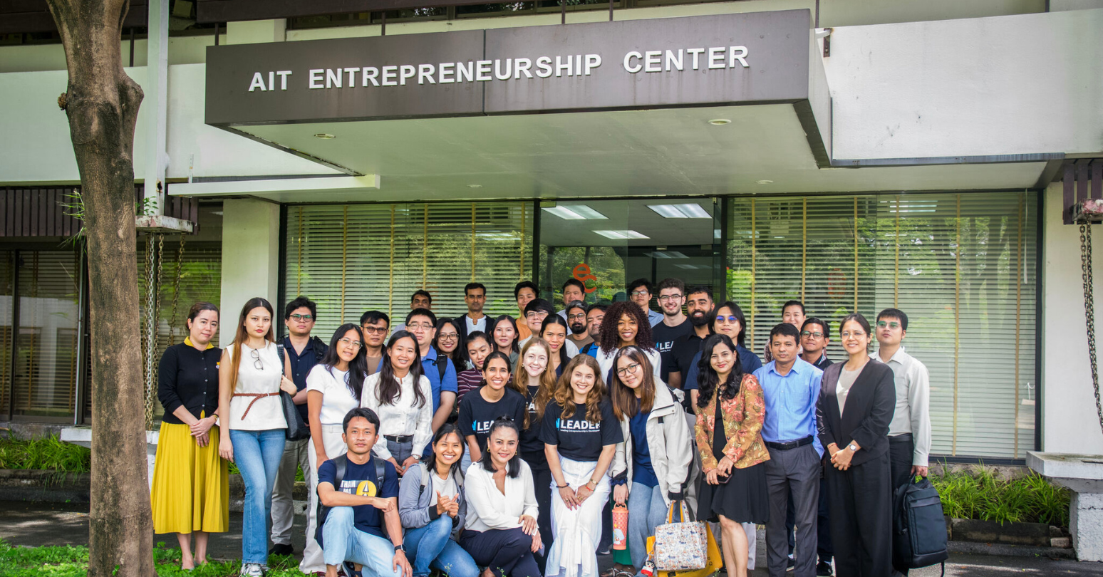 Group Photo Of The LEADER And AIT Team