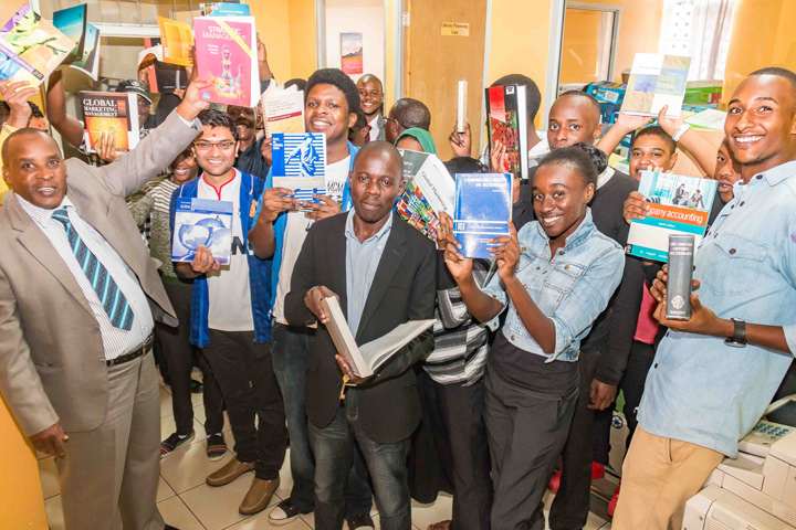 Faculty from Riara University in Kenya receiving a container shipment