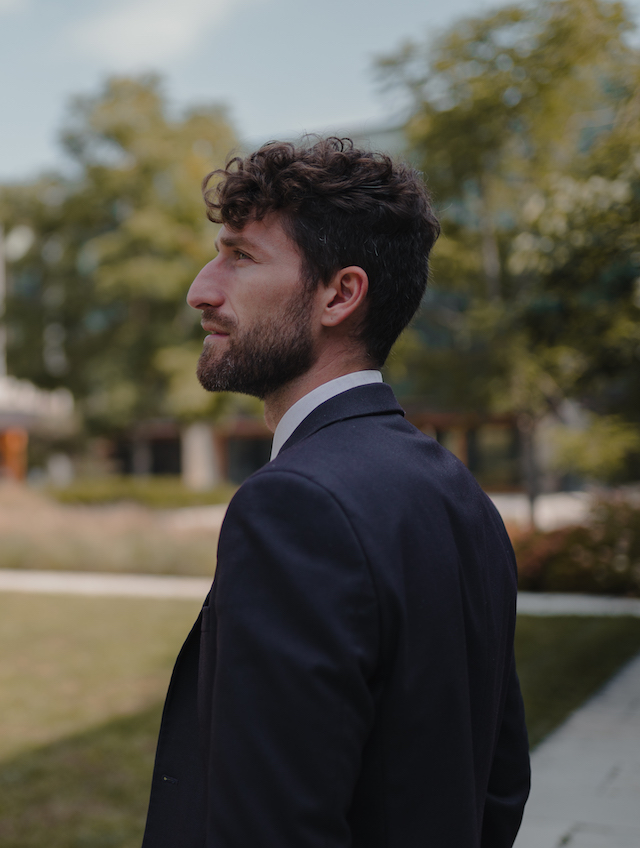 Photo of Jury Gualandris looking into distance outdoors