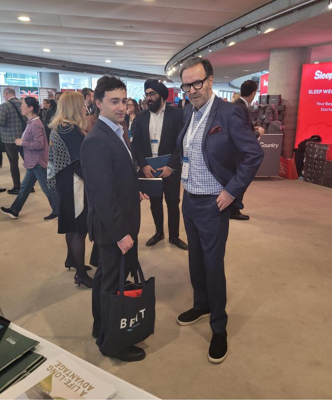 George Athanassakos talking to Ivey Alumni Matthew Ryan with Kim Shannon and Karanvir Singh in the background