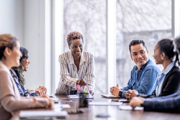 Woman leading business meeting